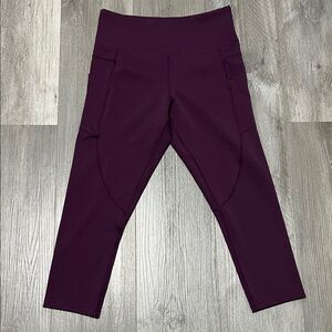 ZYIA woman’s  Crop Leggings with pockets in Deep Plum/ 6-8